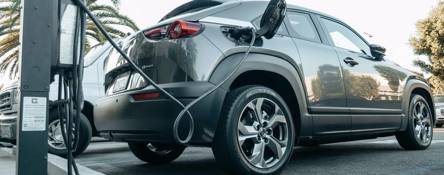 An EV car charging at the station